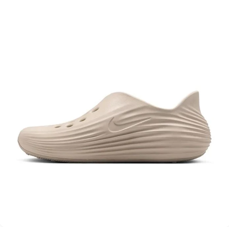 Nike Beige Slip-On Clogs with Sculpted Wave Design