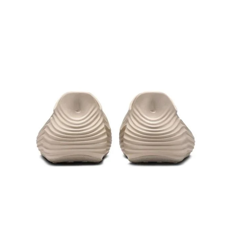 Nike Beige Slip-On Clogs with Sculpted Wave Design
